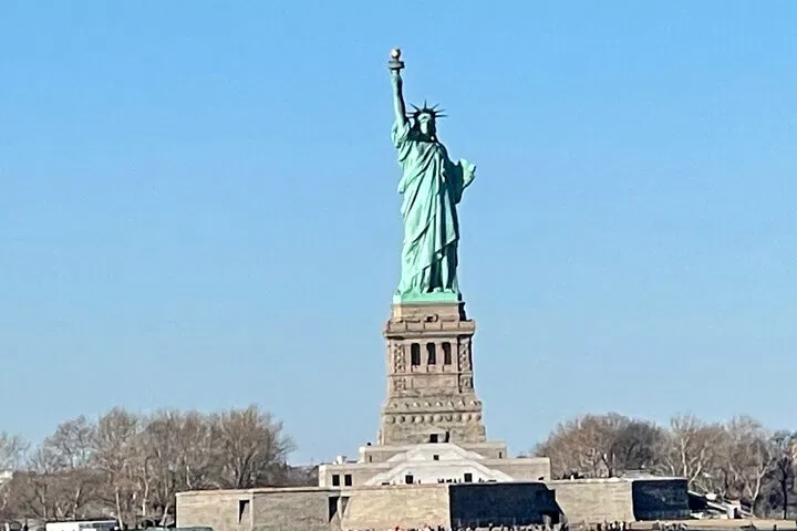 NYC Bus & Boat Adventure: Liberty, Landmarks & Hidden Gems!
