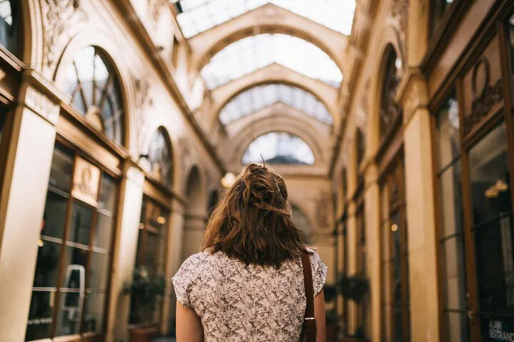 Discovering Parisian Elegance: A Walking Tour Through Covered Passages & Seine Cruise