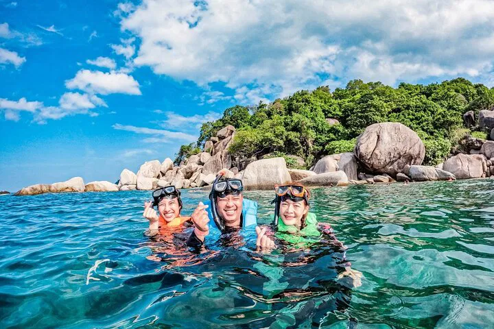 Discover Koh Tao's Underwater Paradise: Snorkeling & Sunset Big Boat Tour