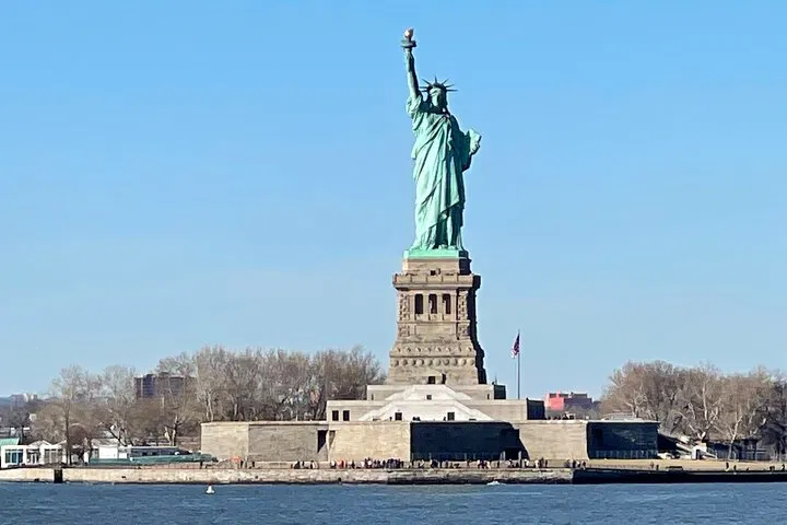 NYC Bus & Boat Adventure: Liberty, Landmarks & Hidden Gems!
