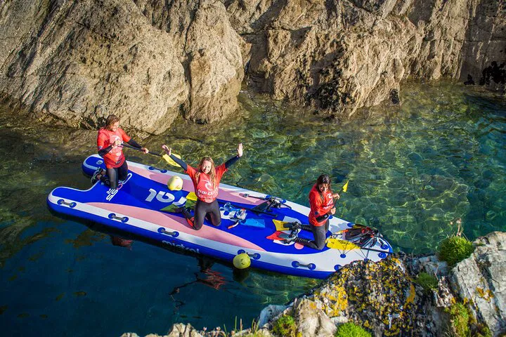 Newquay's Giant SUP Adventure: Teamwork & Coastal Exploration!