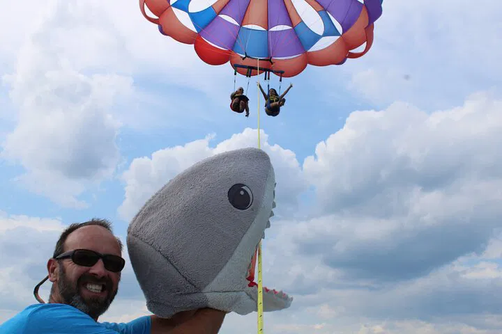 Unleash Your Inner Bird: Parasailing Adventure in New Hampshire & Belize!