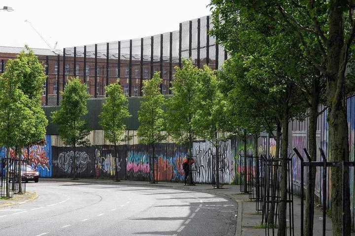 Uncover Belfast's Story: A Black Taxi Mural Tour Through History