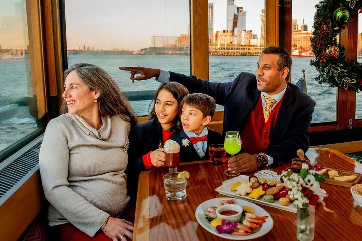 Enchanting NYC Holiday Cruise: Cocoa, Skyline & Festive Cheer!