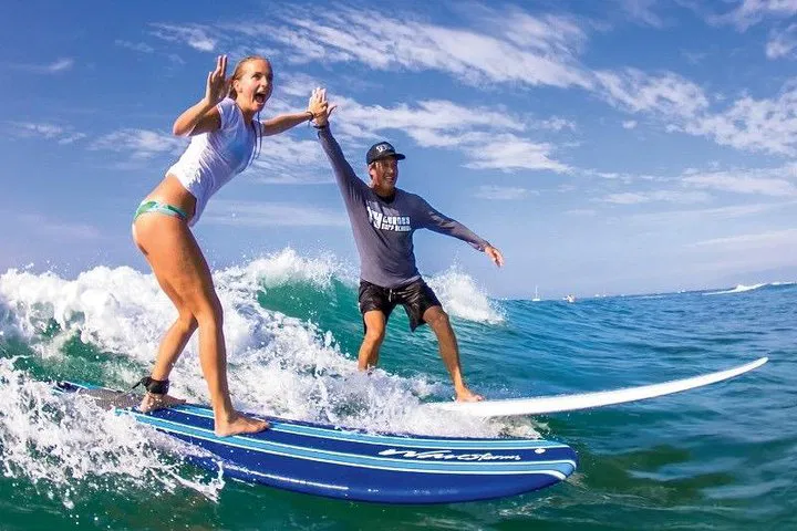 Ride the Waves: Master Surfing with Aloha Surf School in Paradise