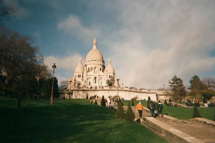 Parisian Dream: Montmartre, Seine Cruise & Shopping Spree with Private Chauffeur