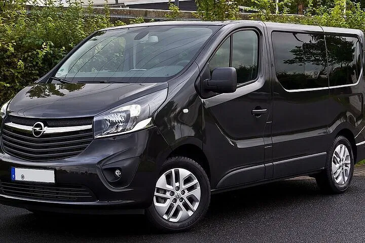 Sustainable Airport Transfer: Manchester Arrival with Carbon Offset