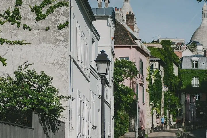 Uncover Montmartre's Artistic Charms: A Private Walking Tour with Croissant & Wine