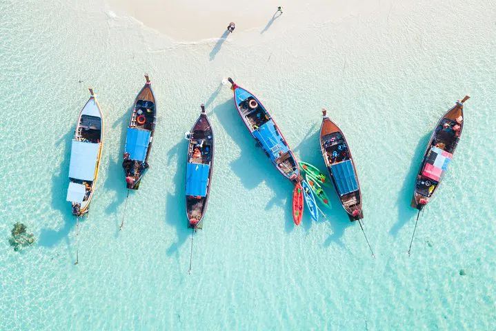 Discover Raya Island: Snorkeling, Swimming, and Thai Cuisine Await!
