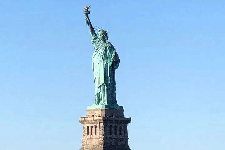 NYC Bus & Boat Tour: Liberty, Landmarks & Hidden Gems!