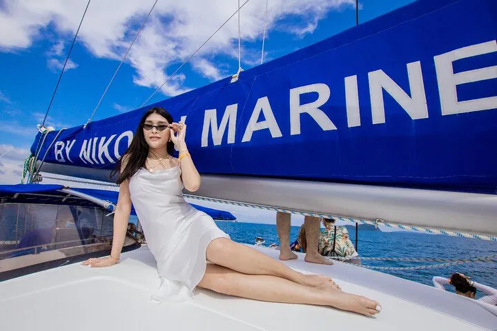 Phuket's Sunset Sailing Escape: Coral Island, Phomthep Cape & Leam Krating Catamaran Cruise