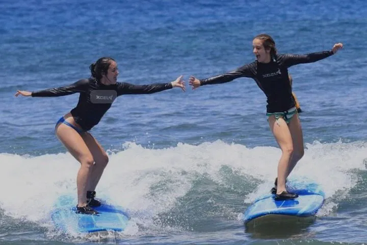 Ride Waikiki Waves: Authentic Hawaiian Surf Lesson Adventure!