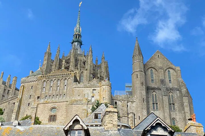 Exclusive Mont Saint-Michel Day Trip: Abbey, Calvados & Luxury Transport