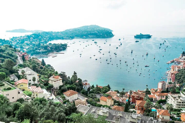 Seamless Genoa-Nice Transfer: Savona Stop & Coastal Delights!