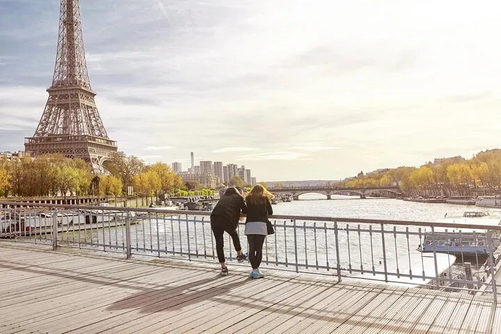 Uncover Paris's Charm: Eiffel Tower, Louvre & Seine River Shared Walking Tour