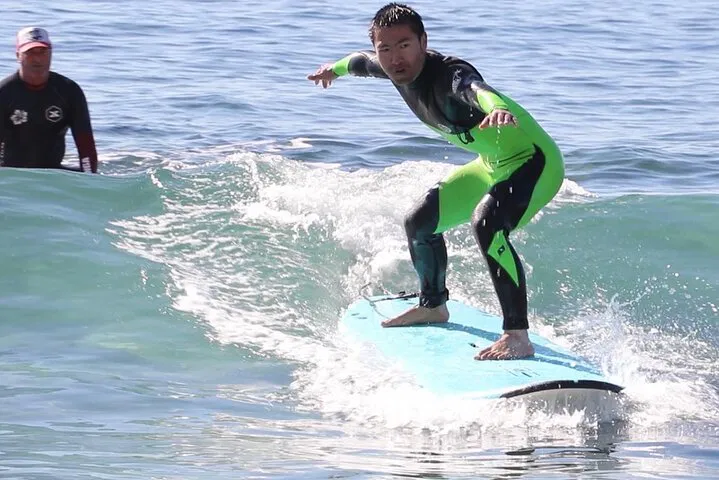 Ride the Waves: Surfing & SUP Lessons with Laguna's Champ!