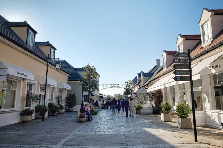 Parisian Grand Tour: Eiffel Tower, Luxury Shopping & Historic Charm