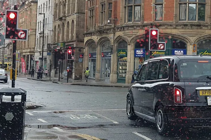 Effortless Manchester Airport Transfers: Ride in Electric London Taxi Elegance