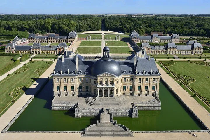 Unlock Vaux-le-Vicomte's Secrets: A Private Minivan Tour from Paris