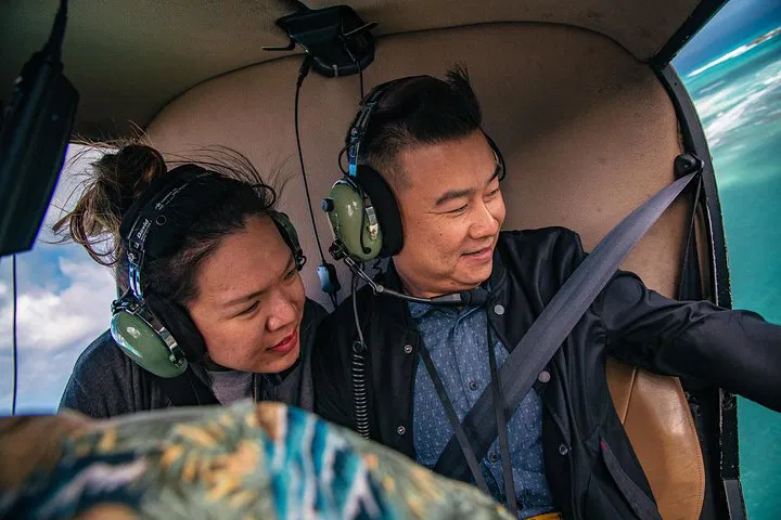 Elevate Your Proposal: Helicopter Banner Flight Over Oahu!
